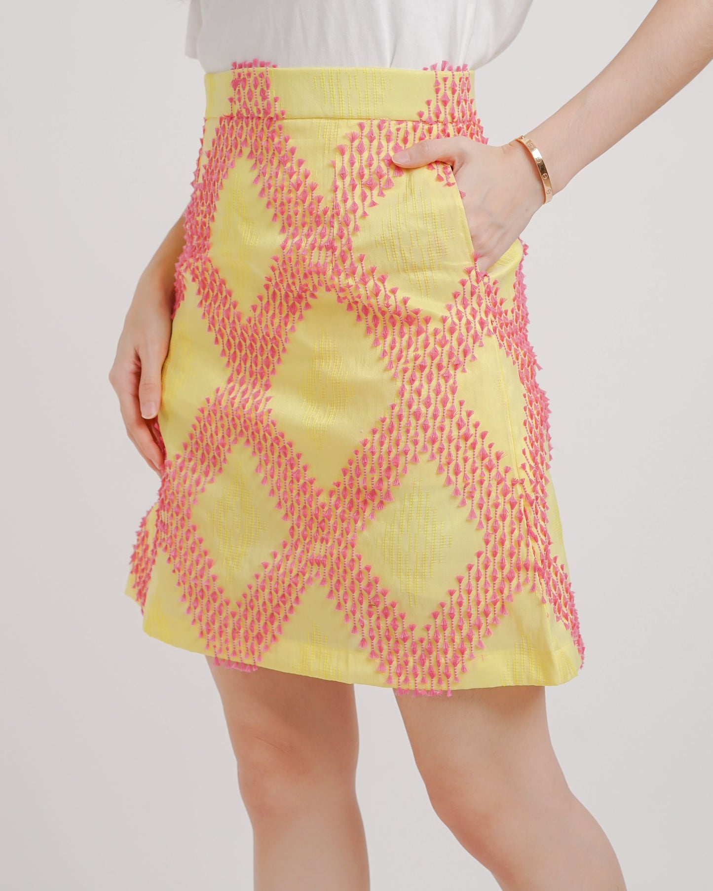 Emilie tenun mini skirt yellow pink
