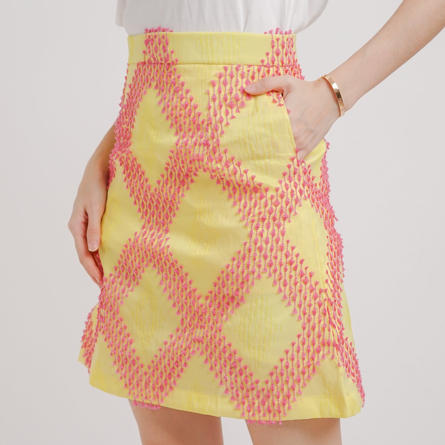 Emilie tenun mini skirt yellow pink